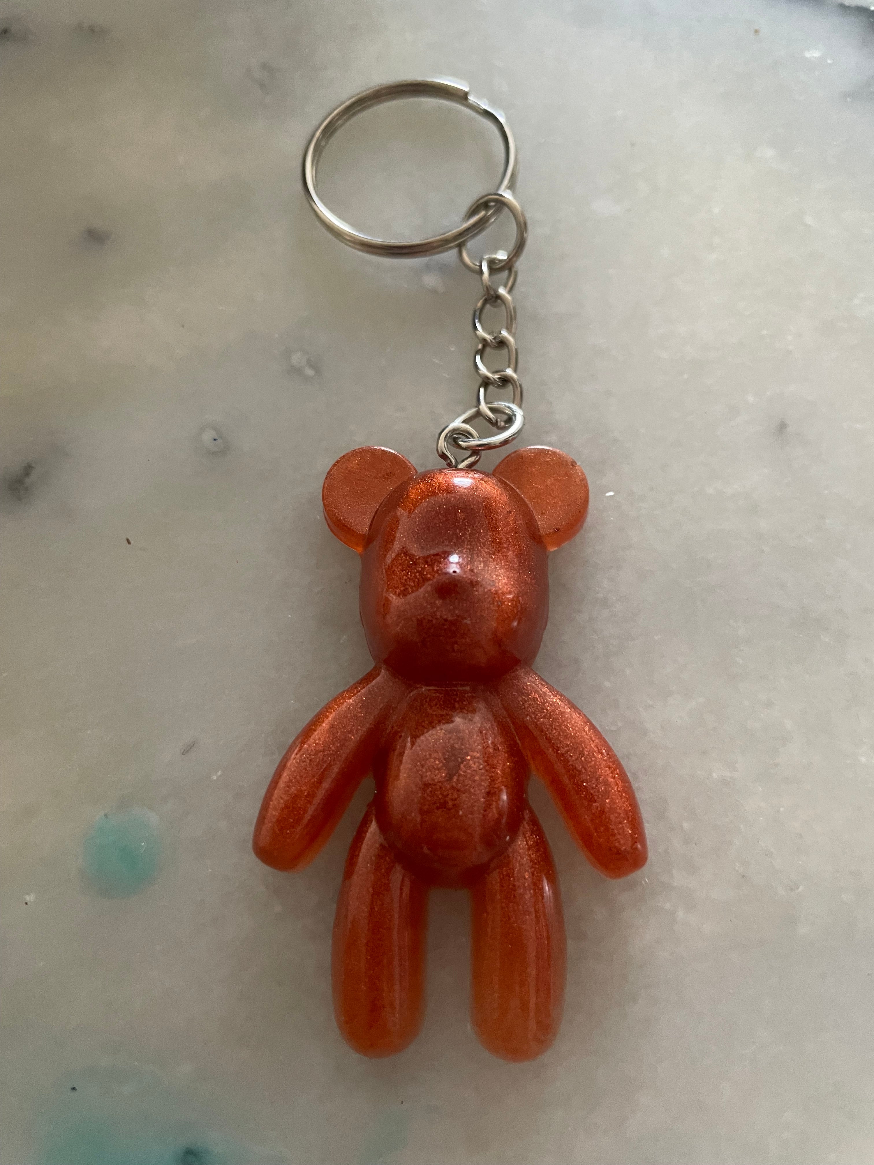 Porte clé fin ours bronze