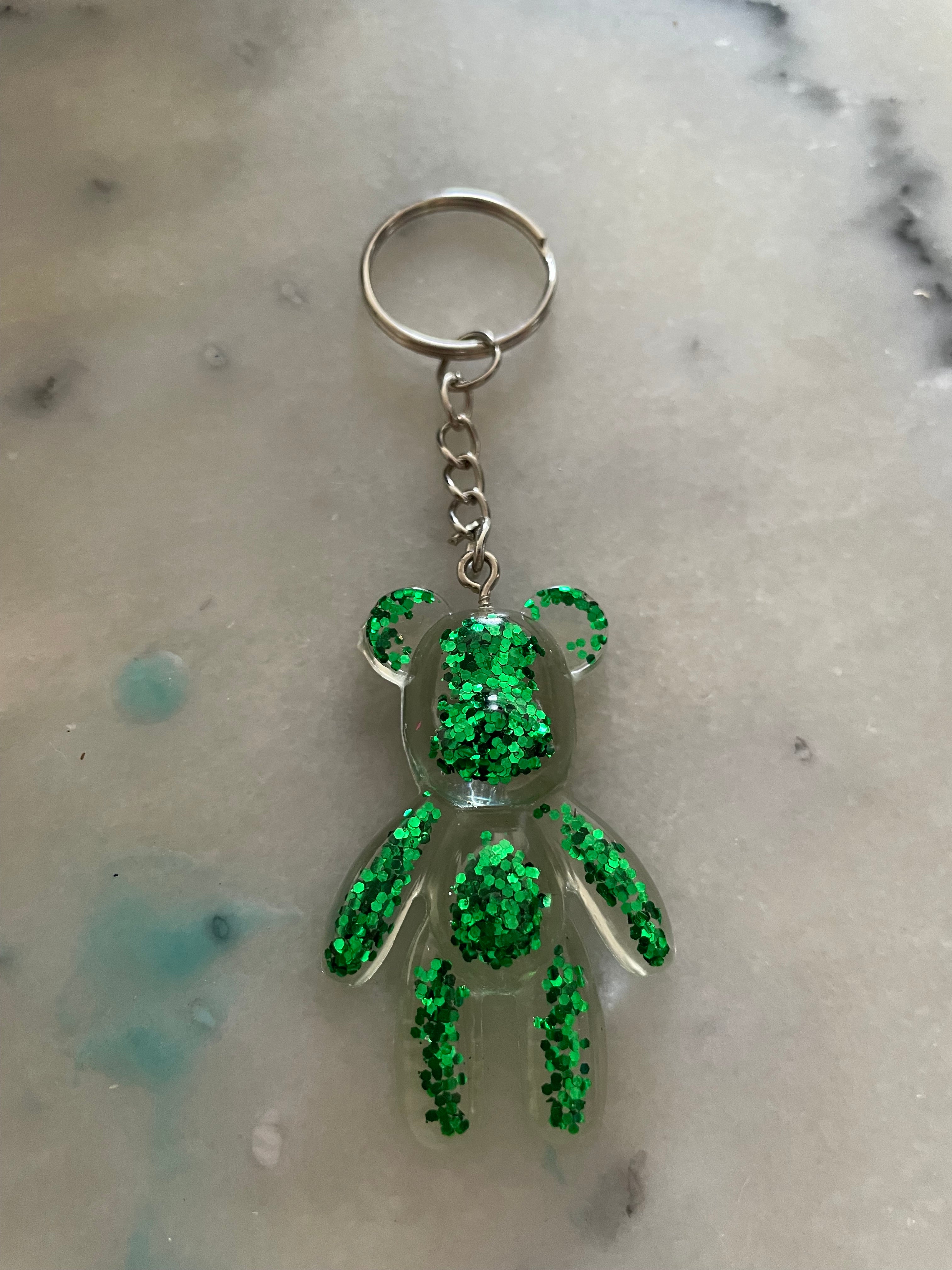 Porte clé fin ours vert pailletté